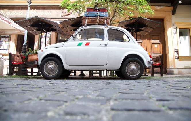 Mini car with luggage for Tips for Driving in Italy hero image