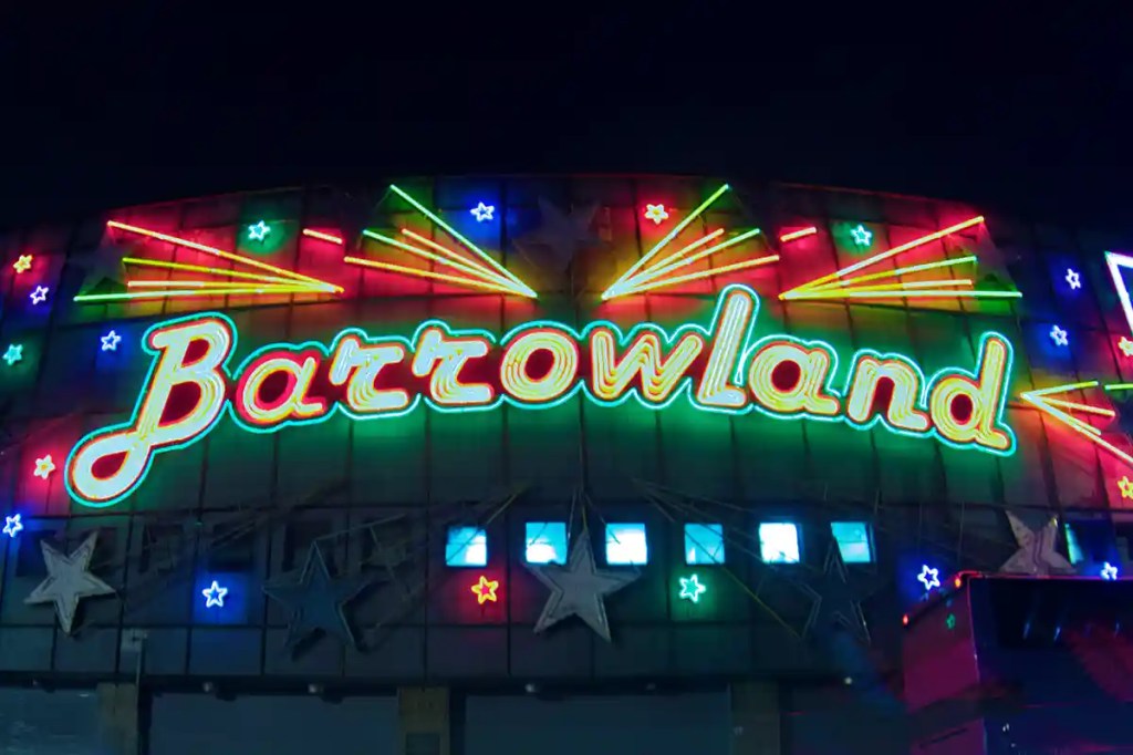 Neon Barrowland sign illuminated at night above the famous Glasgow music and dance venue.